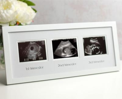 China Durable Creative Wooden Trifold Photos Wooden MDF White Picture Frame For Pregnancy Celebration for sale