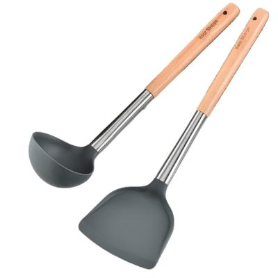 China Creative Logo Kitchen Tools Spatula Shovel Viable Soup Spoon With Wooden Handle Design Silicone Heat Resistant Kitchen Tool Kit for sale