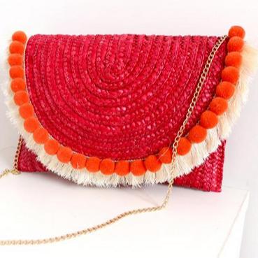 China New Tote Bag Holiday Style Red Tassel Handbag Handmade Straw Bag for sale