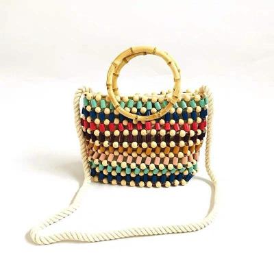 China Fashion \ Factory Shell Summer Beach Comfortable Handbags Woven Rattan Bag \ Durable Round Straw Shoulder Bag Women Handmade Bags for sale