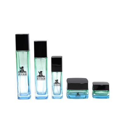 China Glass Body Lotion Cosmetic Empty Cosmetic Bottles With Pump for sale