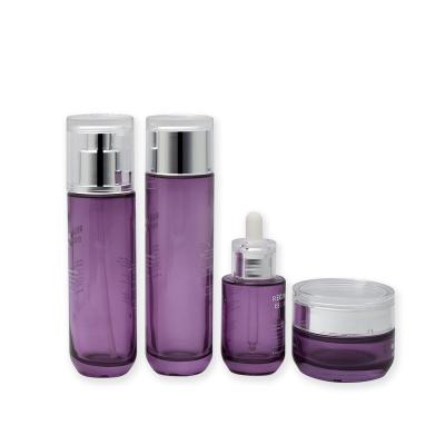 China New 50ml Toner Bottle , 100ml Personal Care Purple Glass Cosmetic And Jar for sale