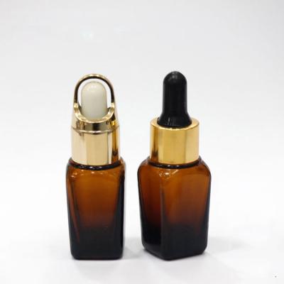 China 5ml 10ml 15ml Cosmetic Amber Essential Oil Container Custom Glass Bottle With Dropper for sale