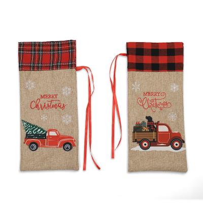 China Christmas Day Christmas Plaid Decorations Hot Sale Car Canvas Wine Bottle Cover Red Wine Creative Bag Christmas Home Decor for sale