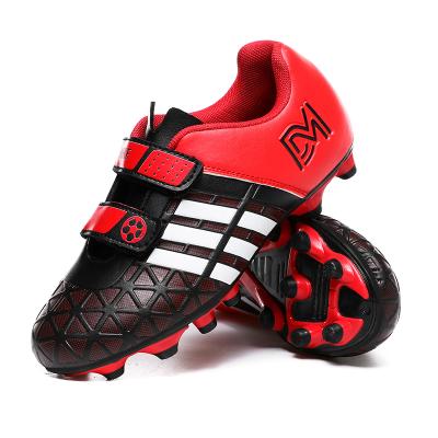 China Low-cut Children's Soccer Shoes Velcro Training Shoes Elementary School Sports Shock-absorbent Low-cut Shoes Men and Women Broken Nails Teenagers for sale