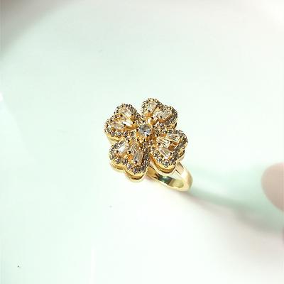 China CLASSIC New Fashion Luxury Four Leaf Clover Rotary Windmill Inlaid Full Zircon Ring Female Trend Personality Lucky Clover Jewelry for sale