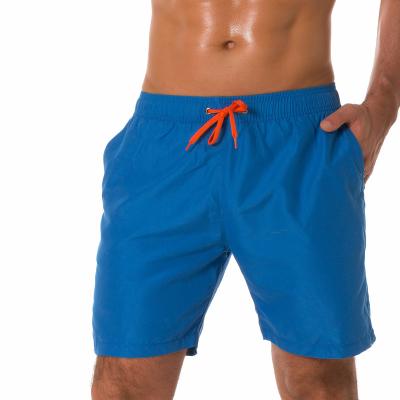 China Breathable European and American Beach Pants Men's Solid Color Quick-drying Shorts Slim Casual Surf Pants for sale