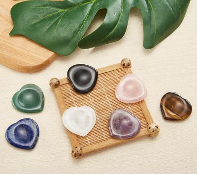 China Natural Heart Shaped Concave Traditional Scratch Stone Finger Jade Massager Face Lift Stone Natural Crystal Panel Beauty Massage Products for sale