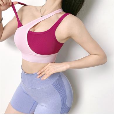 China 2021 Breathable Women Padded High Impact Shockproof Sports Bra Seamless Workout Fitness Tops Cross Back Yoga Bra for sale