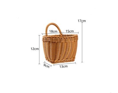 China Amazon Popular Rattan Woven Kitchen Ginger Garlic Storage Basket Flower Wall Mounted Portable Basket Viable for sale