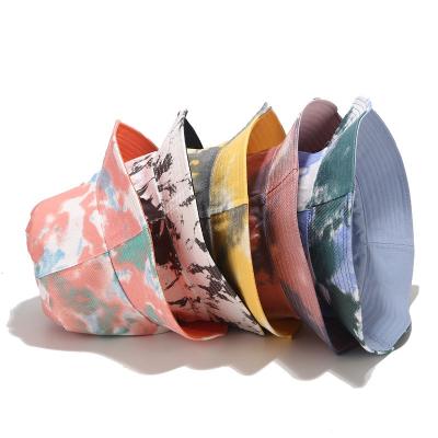 China 2021 Hot Selling Character Ins Summer Tie Dye Double Use Cotton Solid Color Hop Hop Side Floppy Fisherman Hat Graffiti Unisex Bucket Hat for sale