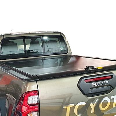 China Manual/Electric for Toyota Retractable Pickup Truck Bed Cover Aliuminu Alloy Roll Cover Hard Tonneau Cover For Hilux Revo/Vigo/Trd/Adventure2021 for sale