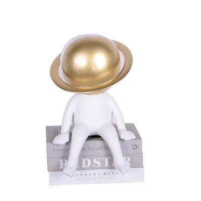 China White Simple Modern Europe Home Decor Resting Resin Space Pose Astronaut Figurine for sale