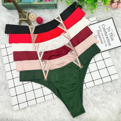 China Anti-Bacterial European and American low waist swimming cloth V-shaped metal decorative Briefs seamless sports hip lifting underpants for women for sale