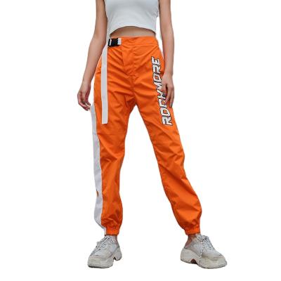 China IHSK32 Wholesale QUICK DRY women's letter printing bright orange harem pants zipper ladies casual pants for sale