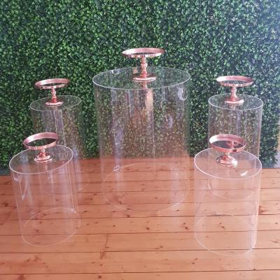 China Acrylic white round cylinder form acrylic pallle wedding clear acrylic pedestal for wedding party event decoration for sale