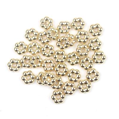 China Jewelry Making Faceted Gold Mango Cutting Pearl Ground Beads Gold Round Beads for sale