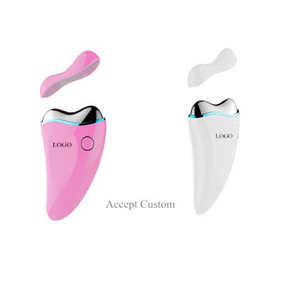 China Wholesal Portable Universal Electric Facial Massager Vibrating Skin Care Led Mini White Facial Hot Cold Massage for sale