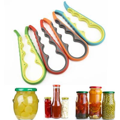 China Viable 4 In 1 Multi Function Can Bottle Opener Kitchen Jar Opener With Silicone Handle Easy To Use for sale