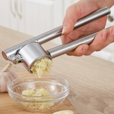 China Kitchen Instrument Garlic Press 304 Stainless Steel Garlic Press Meat Grinder Garlic Grinder Zinc Alloy Garlic Press for sale