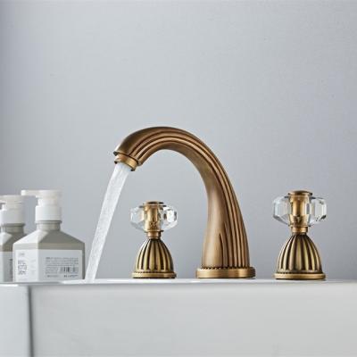 China Gold Metered Brushed Bath Faucets Tub Faucet And Shower Faucet 3 Hole Basin Mixer Tap With Hand Showe Head Hot And Cold Water Faucet for sale