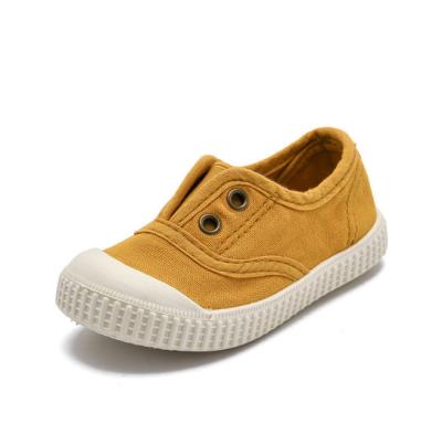 China Solid Color Kids Canvas Flat Soft Rubber Sole Casual Shoes for sale