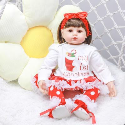 China Changeable Clothing 24 Inch Lifelike Silicone Vinyl Dolls Christmas Gifts Reborn Doll Toys Wearing Christmas Costume Dress for Kids for sale