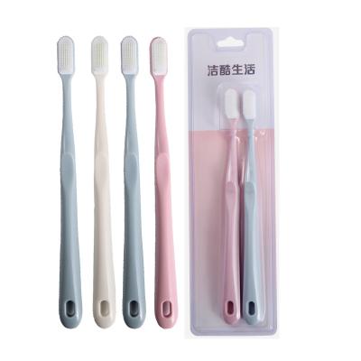 China Custom blue&pink handle 2pcs ultrasoft nano toothbrush wholesale cheap disposable toothbrush 10000 nano toothbrush for sale