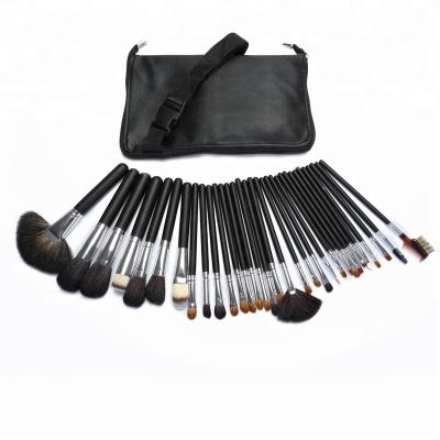 China Angular Blush 32pcs Luxury Natural Hair Makeup Set Brush With Belt Bag For Makeup Artist for sale