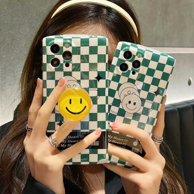 China Central Institute of Anti-drop Statistics the same green checkered smiley face with cell phone holder anti-drop mobile phone case for iPhone12 for sale