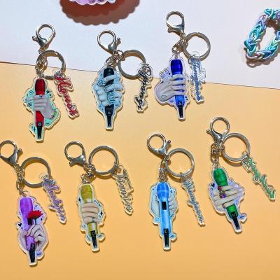 China Creative Promotion Gift Custom Creative Microphone Shape Acrylic Key Chain Pendant 2 Pieces Set Plastic Key Chains for sale