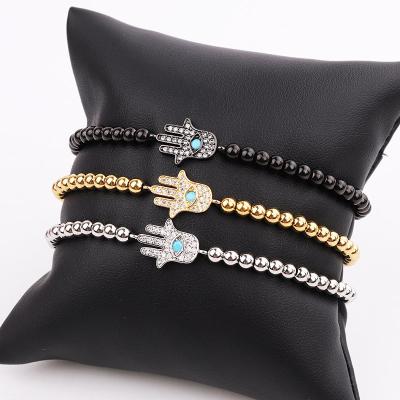 China Small Cute Stainless Steel Micro CZ Beads Pave Diamond Hamsa Hand Charm Friendship Braded Women Adjustable Bracelet for sale