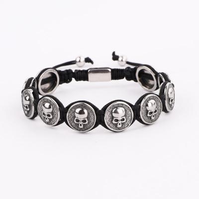 China CLASSIC Personalized Design Stainless Steel Skull Charm Custom Logo Braided Friendship Adjustable Men Macrame Bracelet for sale