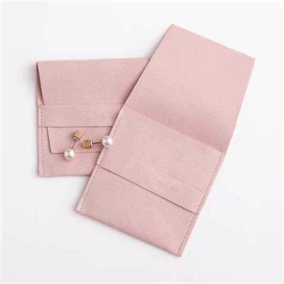 China custom embossed suede microfiber jewelry pouch with insert card pads custom logo for sale