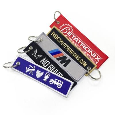 China Custom Fabric Embroidery Key Tags For Motorcycle Ebroidered Keychains en venta