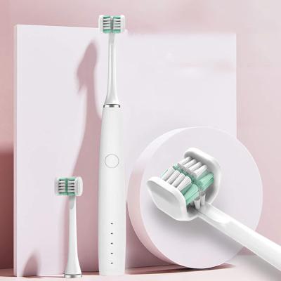 China Dropshipping New 2022 Battery Powered Electric Toothbrush Super Soft Three Head Sonic Toothbrush Oral Care for sale