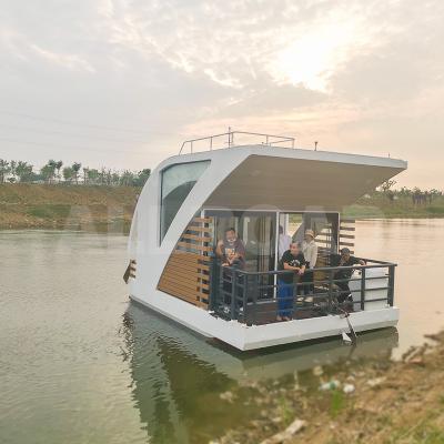 China Modern On The Water Hotel Houseboat Tiny House Mobile Container Hotel Floating Accommodation Prefab Floating House for sale