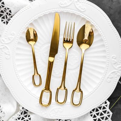 China Creative Western Hot-selling Ring Handle Cutlery For Hotel Restaurant 18/10 Stainless Steel Gold Cutlery Set for sale