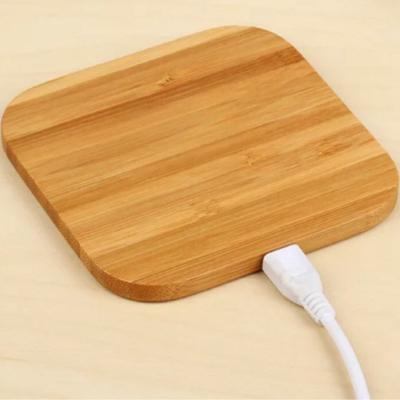 China UniversalÂ   Factory supply bamboo wooden fast wireless charger custom logo 5w phone chargers for mobile phone for sale