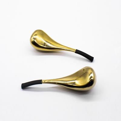 China New Arrival Face Skin Care Machine Golden Spoon Shape Face Massager With Coolant Gel Set Of 2 for sale