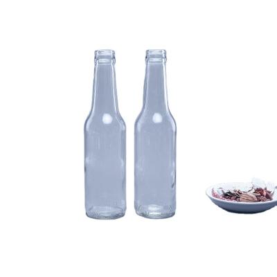 China Beverage Factory Low Price 330ml Glass Beer Bottle For Alcohol Juice Beverage With Mental Caps for sale