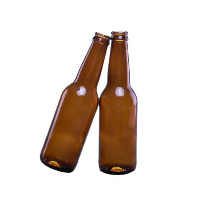 China Beer Bottle Hot Selling Amber Beverage Bottle 330ml Glas Clear Or Brown Empty Glass Beer Bottles For Beer Shimmer With Crown Cap for sale