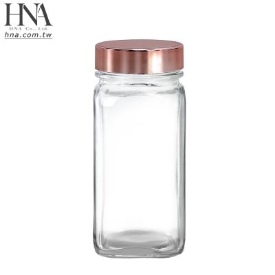 China Sustainable HNA Taiwan Made Glass Spice Jars 4 Ounce Square Bottles With Rose Gold Lid for sale