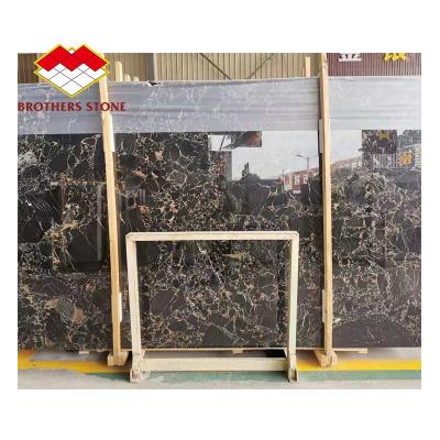 China Modern Black Vein Gold Marble Price For Polished Slabs And Tiles for sale