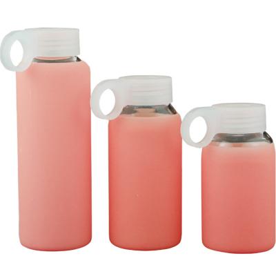 China Sustainable Candy Color Glass Drinking Unbreakable Glass Water Bottle With Silicone Sleeve for sale