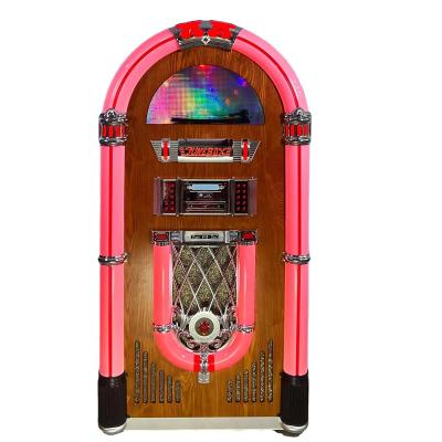 China Classic Home Music Player Wall Mounted Coin Operated Desktop Led Colorful Lights Jukebox Fm Radio 10 Meters Blue-tooth Cd Player Retro Jukebox machine for sale