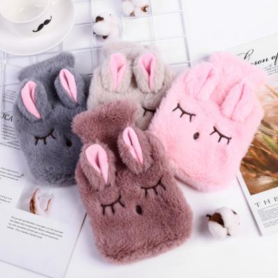 China Cute PVC Stress Pain Relief Therapy Bag with Knitted Soft Cozy Cover Winter Warm Hand Warmer hot water bottle rubber Te koop