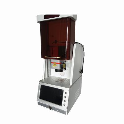 China Air-cooled QK-F20SH Smart high-end  fiber laser marking machine for All metal products together with partial plastic products marking for sale