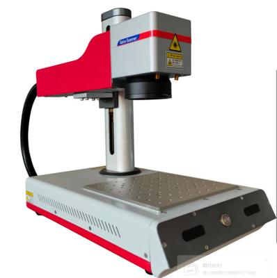 China Air-cooled Desktop QK-F20D  fiber  laser marking machine for metal products and partial plastic products marking for sale