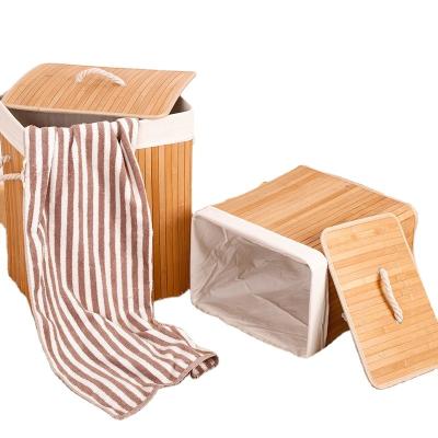 China Stocked Laundry Basket 100L Bamboo Dirty Clothes Storage Basket With Lid Liner And Handles for sale